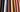 A close up of a row of colored pallets